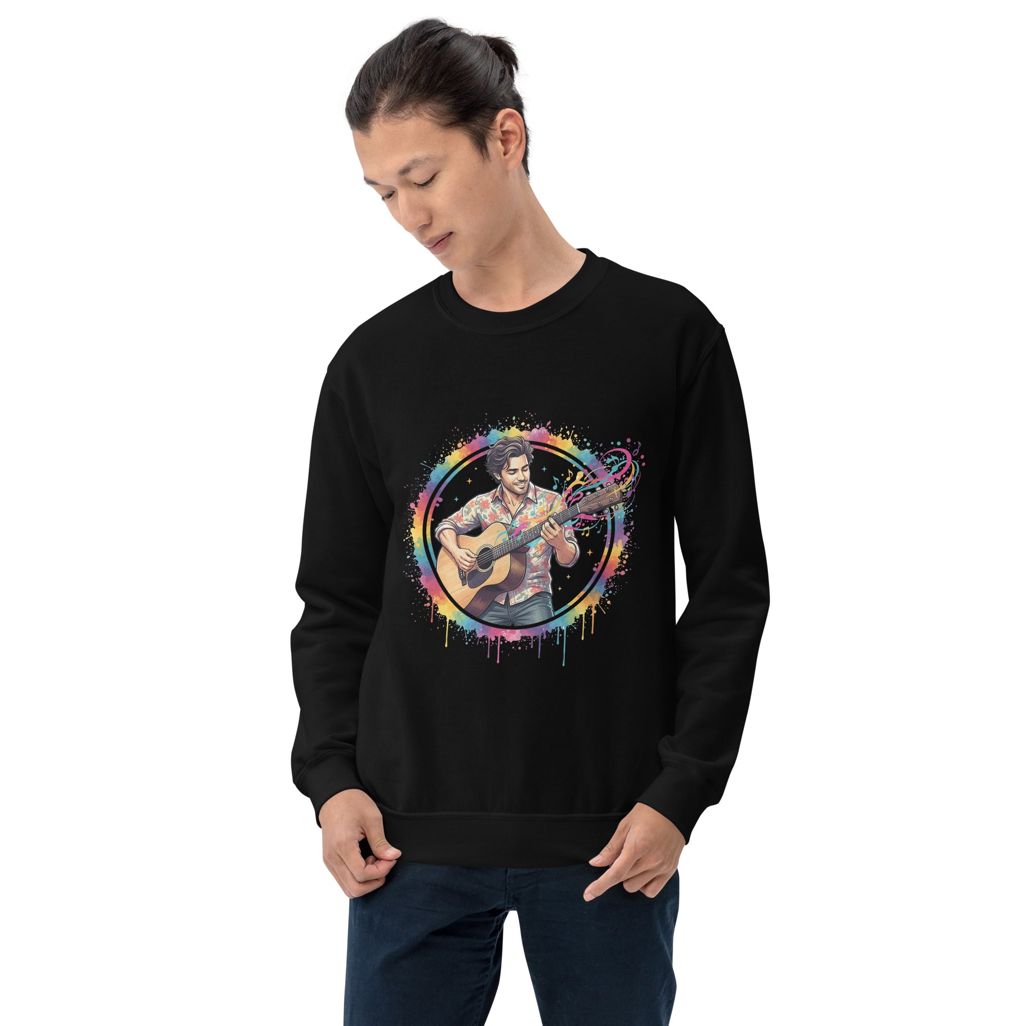 Person wearing a black sweatshirt with a colorful graphic of a person playing guitar.