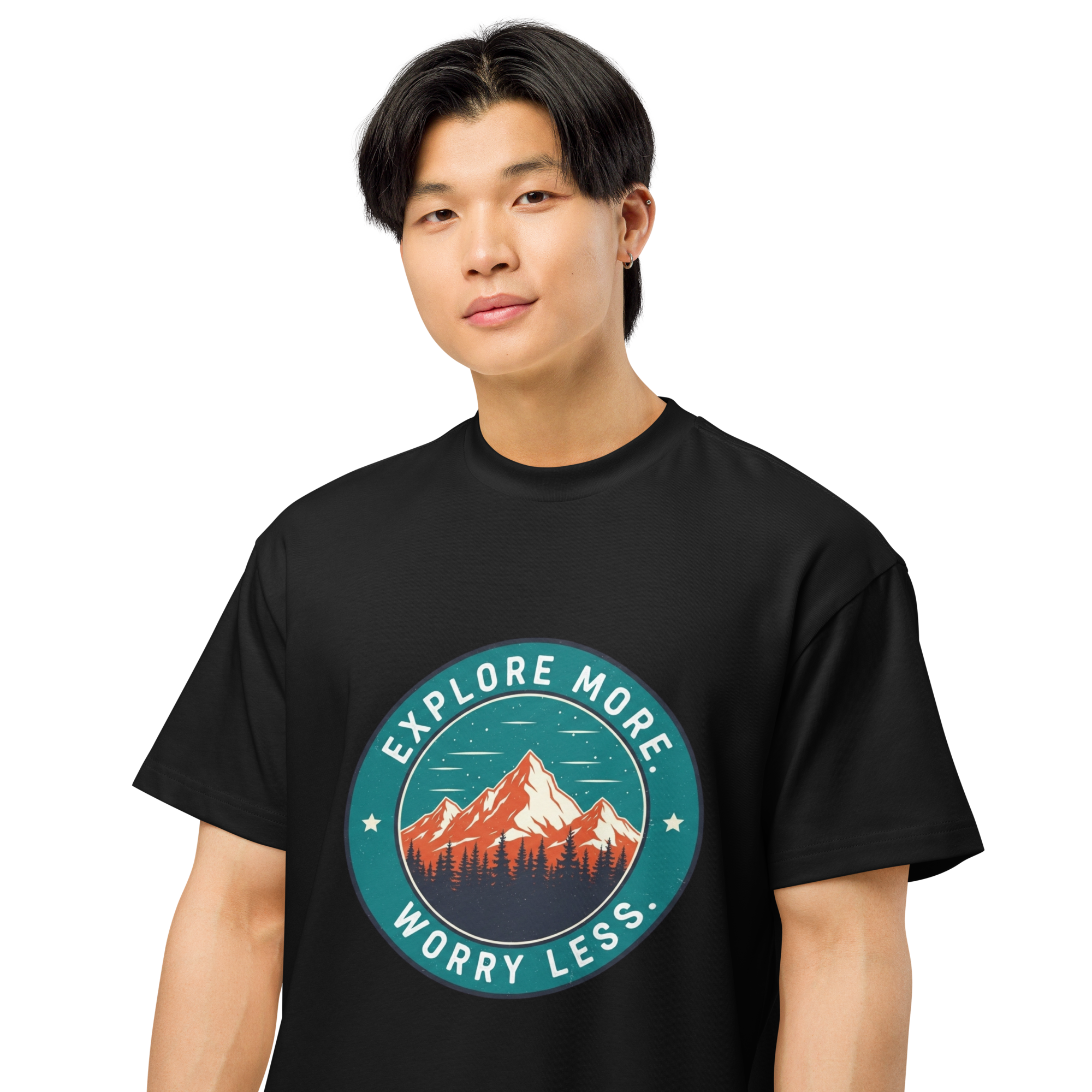 Person wearing a black t-shirt with a mountain graphic and text on a white background