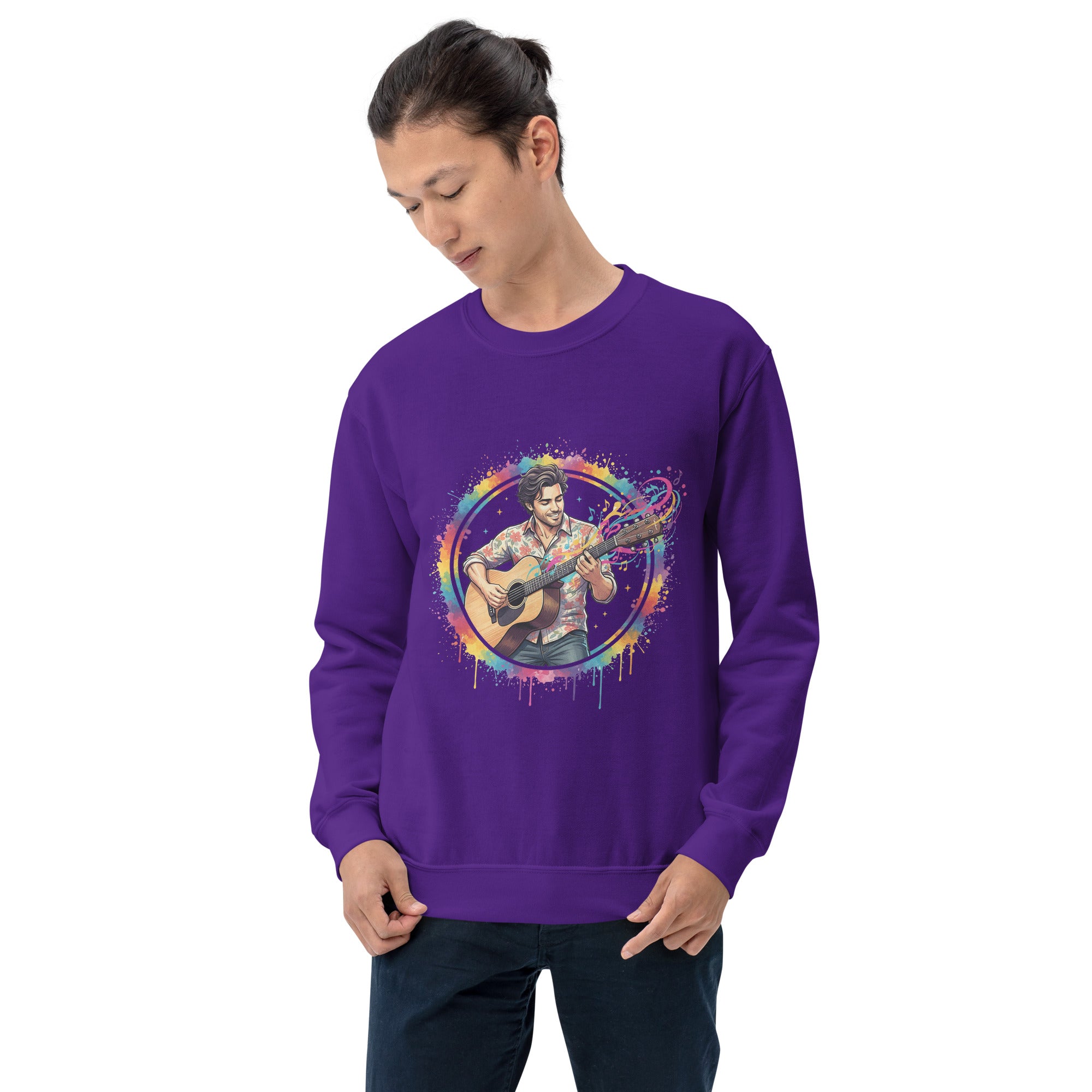 Person wearing a purple sweatshirt with a colorful graphic design on a white background