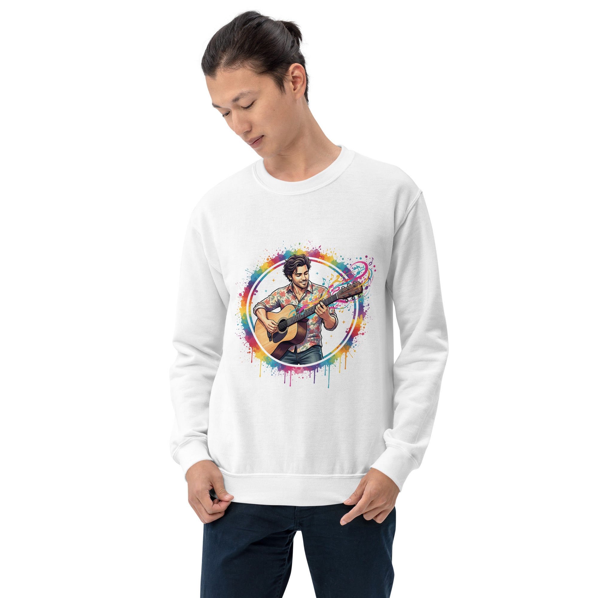 Person wearing a white sweatshirt with a colorful graphic of a person playing guitar.