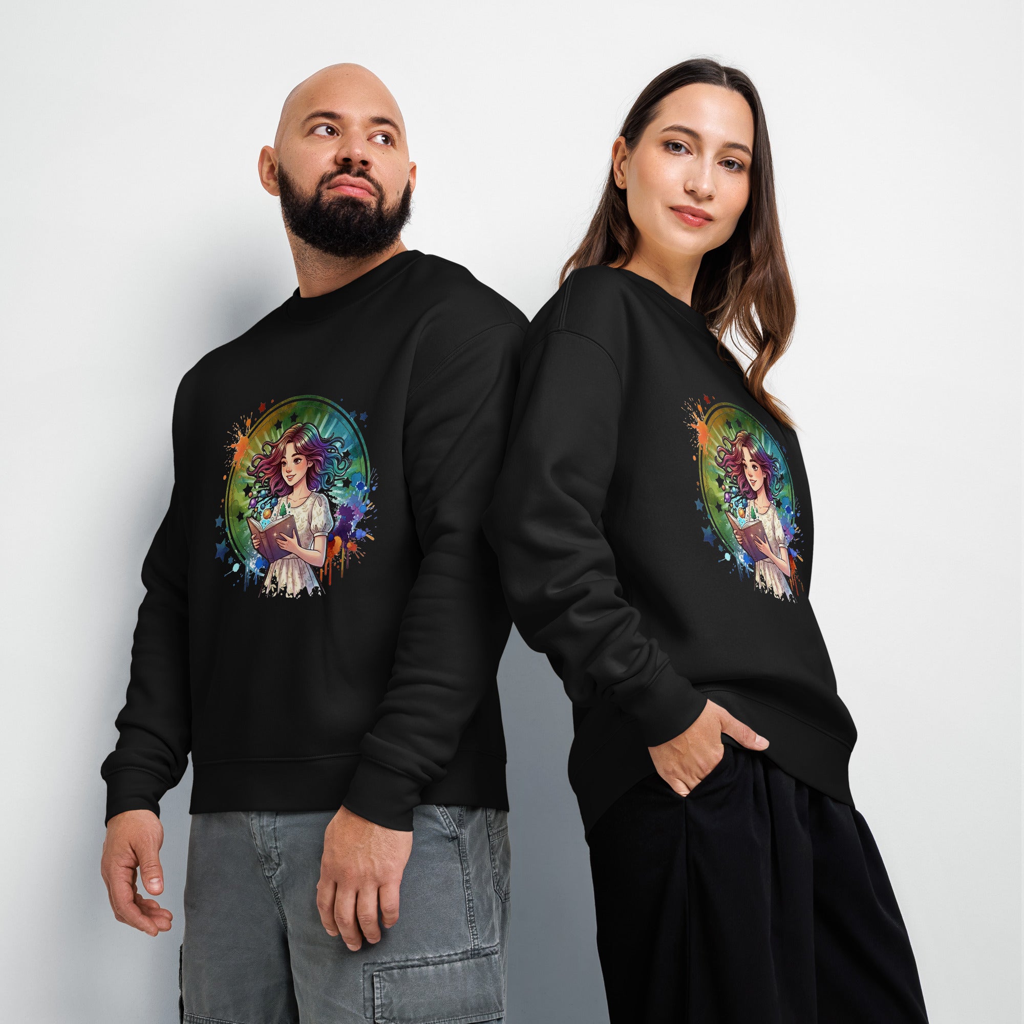 Two people wearing black sweatshirts with a colorful graphic design on a plain background