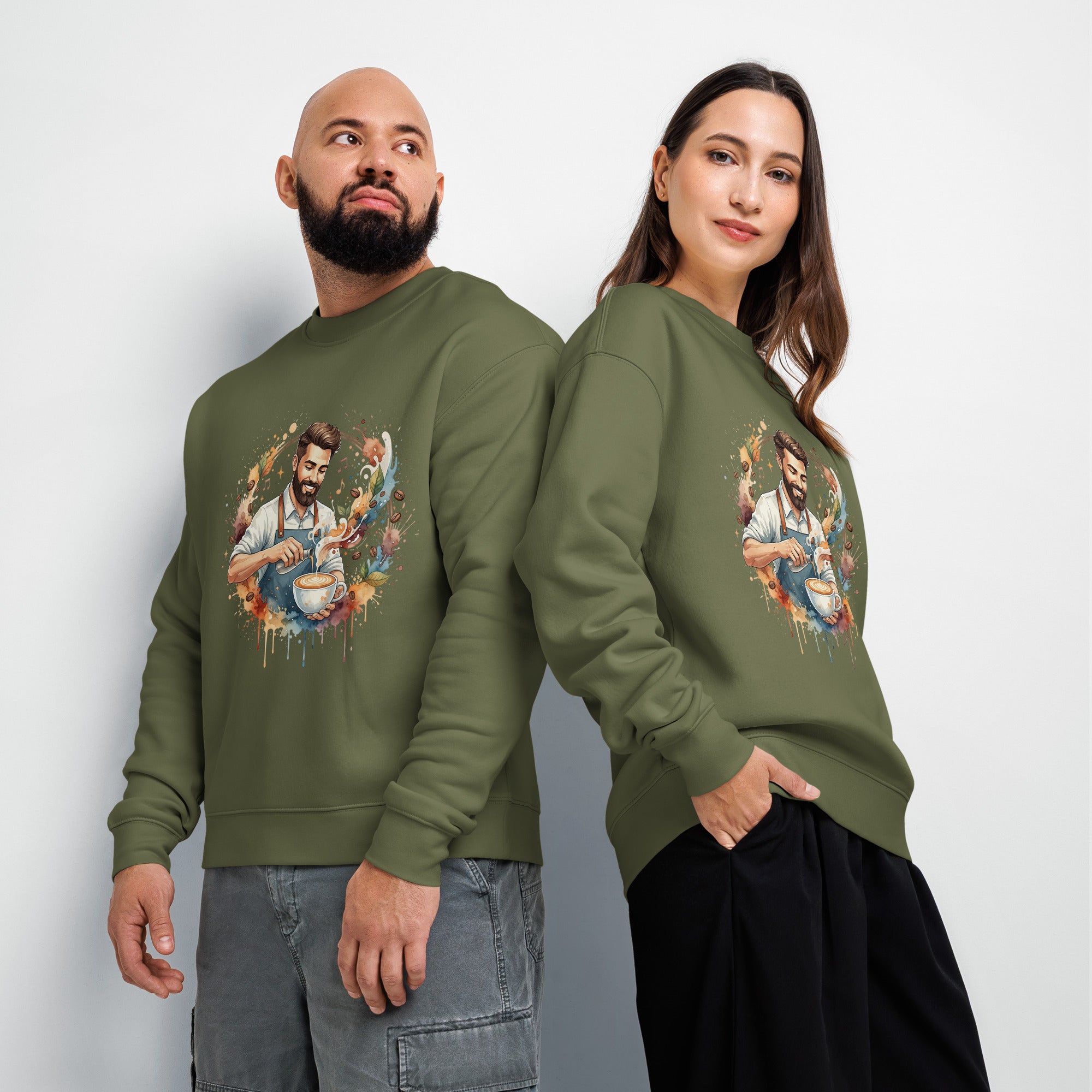 Two people wearing green sweatshirts with a graphic design on a plain background